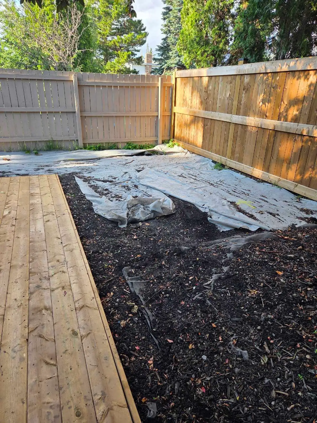 Finished beautiful back deck landscaping install
